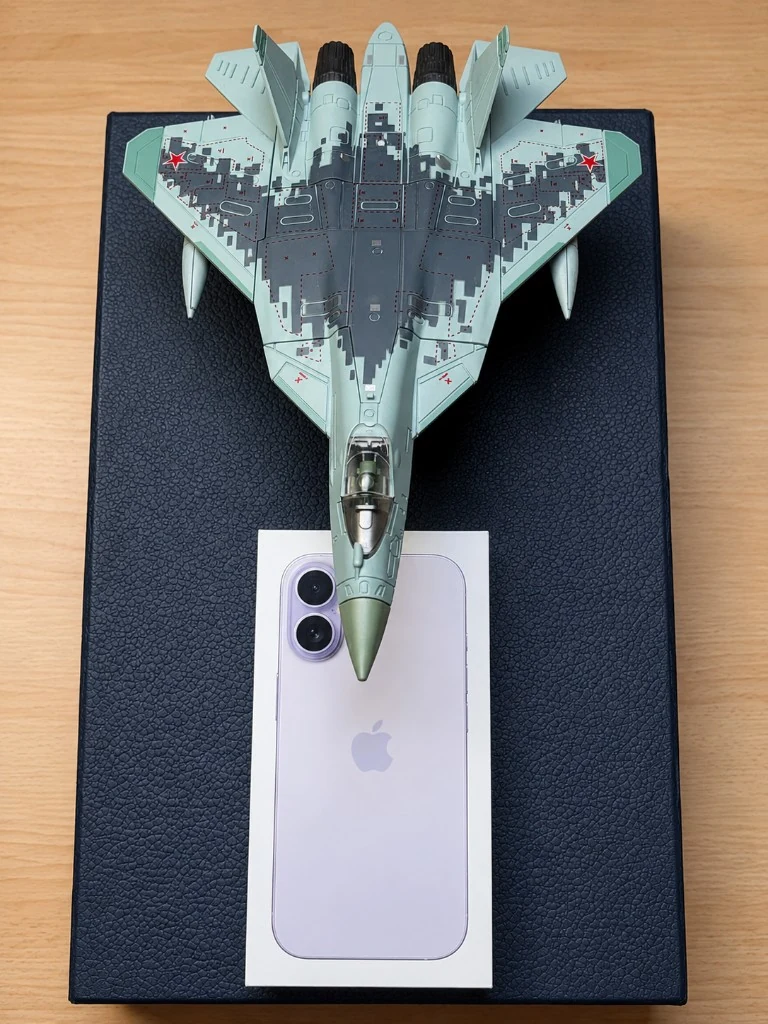 SU-57 1:72 scale model next to an iPhone box for size reference