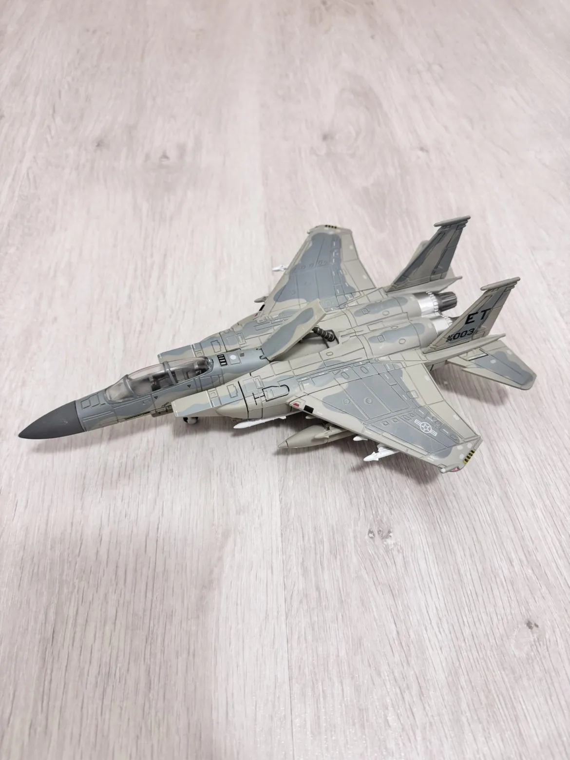 Customer photo — F-15 Eagle 1:72 scale model with camouflage, weapons and landing gear