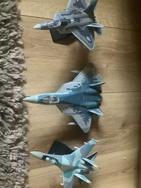Customer photo — three aircraft models on display